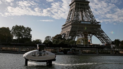 SeaBubbles co-founder Anders Bringdal onboard a SeaBubble by the Eiffel Tower on the river Seine, Wednesday Sept. 18, 2019.