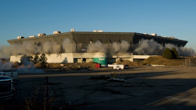 In this Dec. 3, 2017, file photo, detonations seen during an attempted implosion of the Silverdome in Pontiac, Mich.