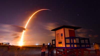 In this May 23, 2019, file photo, a Falcon 9 SpaceX rocket lifts off from Space Launch Complex 40 at Florida's Cape Canaveral Air Force Station, seen from Cocoa Beach, Fla.