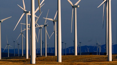 This May 6, 2013, file photo shows a wind turbine farm owned by PacifiCorp near Glenrock, Wyo.