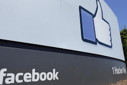 This July 16, 2013, file photo shows a sign at Facebook headquarters in Menlo Park, Calif.