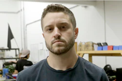 In this Aug. 1, 2018, file photo, Cody Wilson holds a 3D-printed gun at his shop, in Austin, Texas.