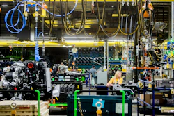 In this June 12, 2019, file photo General Motors employees work on the chassis line as they build the frame, power train and suspension onto the truck's body at the Flint Assembly Plant in Flint, Mich. On Tuesday, Sept. 3, the Institute for Supply Management, a trade group of purchasing managers, issues its index of manufacturing activity for August.