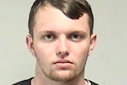 In this photo provided by the Kenosha County Sheriff's Office, Tyler Huffhines is pictured in a booking photo. Huffhines is accused of manufacturing thousands of counterfeit vaping cartridges a day with THC oil for almost two years, running the operation with 10 employees, authorities said.