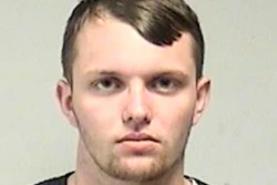 In this photo provided by the Kenosha County Sheriff's Office, Tyler Huffhines is pictured in a booking photo. Huffhines is accused of manufacturing thousands of counterfeit vaping cartridges a day with THC oil for almost two years, running the operation with 10 employees, authorities said.