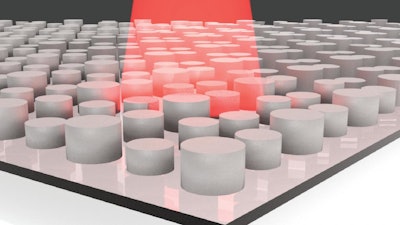An illustration of a dielectric metamaterial with infrared light shining on it.
