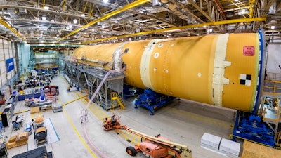 This August 2019 photo released by NASA, shows the core stage for NASA’s Space Launch System (SLS) rocket at the agency’s Michoud Assembly Facility in New Orleans. Kenneth Bowersox, acting associate administrator for human exploration, is casting doubt on the space agency's ability to land astronauts on the moon by 2024. Bowersox told a Congressional subcommittee Wednesday, Sept. 18, 2019, that NASA is doing its best to meet the White House-imposed deadline. But he says he wouldn't bet anything on it.