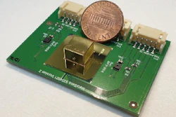 The miniature all-metamaterial optical gas sensor (golden capsule) next to a one-cent coin.