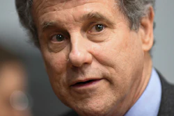 In this March 3, 2019 file photo, Sen. Sherrod Brown, D-Ohio, speaks to reporters during the Martin Luther and Coretta Scott King Unity Breakfast in Selma, Ala. Brown is rolling out a proposal that would force employers to warn workers and retrain them when their jobs are about to be eliminated by automation.