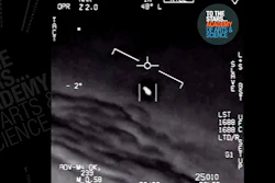 In this undated image made from video from a U.S. Navy aircraft and released by The Stars Academy of Arts & Science, an unidentified object moves near the plane in the air.