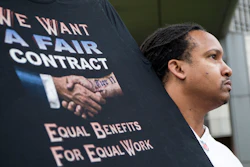 Sean Crawford, of United Auto Workers 598, rallies outside the Marriott Renaissance Hotel while the UAW GM Council holds a meeting inside the hotel in Detroit, Sunday Sept. 15, 2019. The United Auto Workers union announced that tens of thousands of its members at General Motors plants in the U.S. will go on strike Sunday night because contract negotiations with the automaker had broken down.