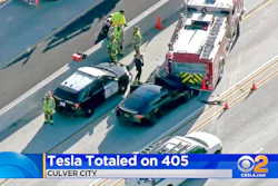 This Jan. 22, 2018, file still frame from video provided by KCBS-TV shows a Tesla Model S electric car that has crashed into a fire engine on Interstate 405 in Culver City, Calif. A government report says the driver of the Tesla that slammed into a firetruck was using the car’s Autopilot system when a vehicle in front of him suddenly changed lanes and he didn’t have time to react. The National Transportation Safety Board said Tuesday, Sept. 3, 2019, that the driver never saw the parked firetruck and didn’t brake.