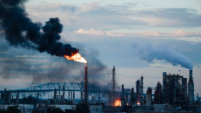In this June 21, 2019 file photo, flames and smoke emerge from the Philadelphia Energy Solutions Refining Complex in Philadelphia. Federal investigators say an aging, failed elbow pipe appears to be the cause of the June fire and subsequent explosions that left five people with minor injuries and destroyed part of the processing unit at the largest oil refinery on the East Coast. The U.S. Chemical Safety and Hazard Investigation Board released a preliminary report Wednesday, Oct. 16 on findings from the June 21 explosion at the Philadelphia Energy Solutions Refining Complex.