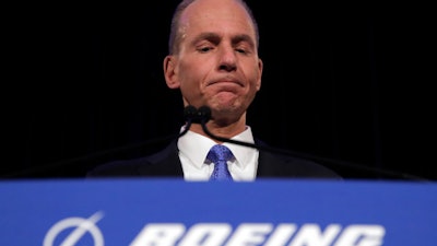 In this Monday, April 29, 2019, file photo, Boeing Chief Executive Dennis Muilenburg speaks during a news conference after the company's annual shareholders meeting in Chicago.