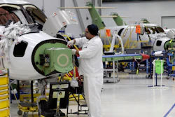 In this July 30, 2019, photo, an employee works on an aircraft in the production area at the Honda Aircraft Co. headquarters in Greensboro, N.C.