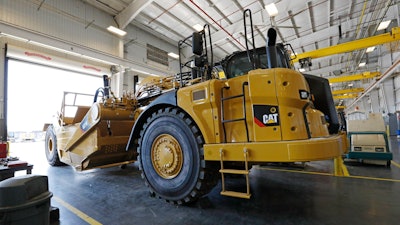 In this Sept. 18, 2019, photo, a new heavy duty Caterpillar grader awaits modification at Puckett Machinery Company in Flowood, Miss.