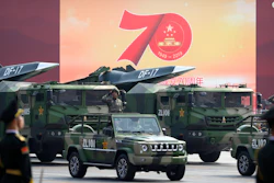 Chinese military vehicles carrying DF-17 ballistic missiles roll during a parade to commemorate the 70th anniversary of the founding of Communist China in Beijing, Oct. 1, 2019.