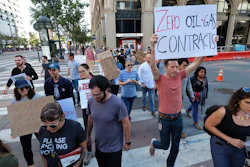 In this Sept. 20, 2019, file photo, Google employees make their way up Market Street to join others in a climate strike rally at City Hall in San Francisco.