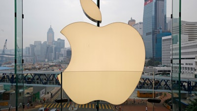 In this Sept. 24, 2011, photo, an Apple logo is displayed at the Apple store in the International Financial Center in Hong Kong.