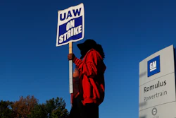 Yolanda Jacobs, a United Auto Workers member, walks the picket line at the General Motors Romulus Powertrain plant in Romulus, Mich., Wednesday, Oct. 9, 2019.