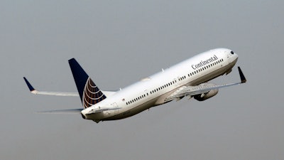 In this Thursday, Jan. 20, 2011 file photo, A Continental Airlines Boeing 737-NG takes off in Tampa, Fla.