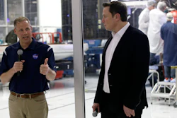 NASA Administrator Jim Bridenstine, left, talks with SpaceX chief engineer Elon Musk at SpaceX headquarters in Hawthorne, Calif., Oct. 10, 2019.