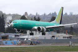 In this April 10, 2019 photo, a Boeing 737 MAX 8 airplane being built for India-based Jet Airways lands following a test flight at Boeing Field in Seattle.