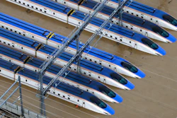 Bullet trains are seen submerged in muddy waters in Nagano, Japan, after Typhoon Hagibis hit the city, Sunday, Oct. 13, 2019.