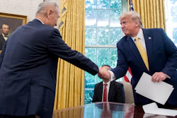 In this Oct. 11, 2019, file photo, President Donald Trump shakes hands with Chinese Vice Premier Liu He.