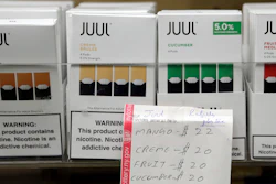 In this Dec. 20, 2018, file photo, Juul products displayed at a smoke shop in New York.