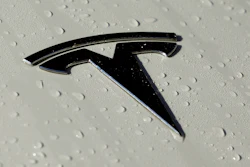 This Oct. 18, 2019, photo shows a Tesla logo in Salt Lake City.