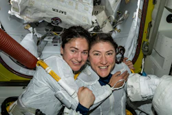 In this photo released by NASA on Friday, Oct. 18, 2019, U.S. astronauts Jessica Meir, left, and Christina Koch pose for a photo in the International Space Station.