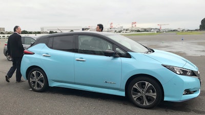 In this Oct. 18, 2019, photo, Nissan's electric vehicle with new 'all-wheel-control' technology is ready for a demonstration to reporters at its Oppama test driving course near Tokyo.