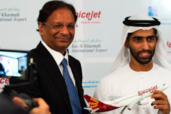 SpiceJet chairman and managing director Ajay Singh, left, and Sheikh Khalid bin Saud Al Qasimi pose for photographs during a news conference in Ras al-Khaimah, United Arab Emirates, Oct. 23, 2019.