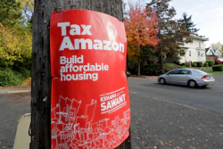 In this Oct. 23, 2019 photo, a campaign poster for Seattle City Council incumbent candidate Kshama Sawant posted outside her campaign headquarters.