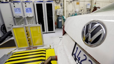 In this Sept. 30, 2015, file photo, a 2013 Volkswagen Passat with a diesel engine is evaluated at the California Air Resources Board emissions test lab in El Monte, Calif.