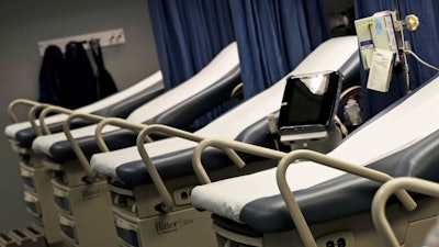 In this Jan. 29, 2018 file photo, beds are set up inside a mobile emergency room outside a hospital in Georgia.