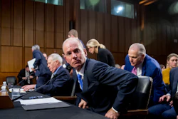 Boeing President and CEO Dennis Muilenburg leaves after testifying on Capitol Hill, Oct. 29, 2019.