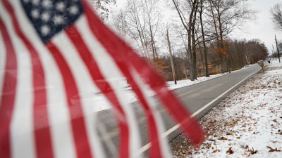 Flag flown from a mailbox along Lyntz Townline Road in Warren, Ohio, Nov. 28, 2018.
