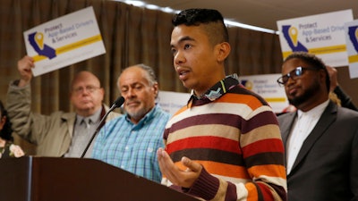 College student Akamine Kiarie during a news conference in Sacramento, Oct. 29, 2019.