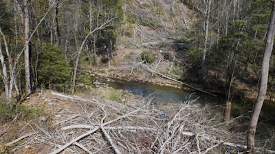 In this Thursday, May 3, 2018, photo, downed trees mark the route of the proposed Mountain Valley Pipeline in Lindside, W.Va.