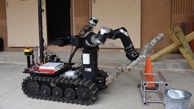 An Army robot plans what to do to address a debris pile full of objects.