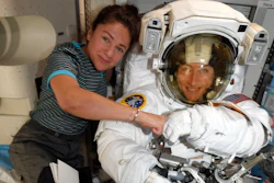 In this image released Friday, Oct. 4, 2019, by NASA, astronauts Christina Koch, right, and, Jessica Meir pose on the International Space Station. The first all-female spacewalk is back on, six months after a flap over spacesuits led to an embarrassing cancellation. NASA announced Friday that the two U.S. astronauts aboard the International Space Station will pair up for a spacewalk later this month.