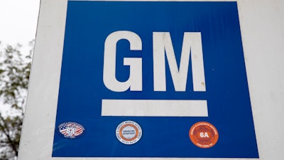 This Oct. 16, 2019, file photo shows a sign at a General Motors facility in Langhorne, Pa. General Motors reports financial earns Tuesday, Oct. 29.