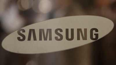 The logo of the Samsung Electronics Co. is seen at its office in Seoul, South Korea, Thursday, Oct. 31, 2019. Samsung Electronics said it operating profit for the last quarter fell by nearly 56%, with its robust sales of smartphone, displays and TVs offset by a continuously weak market for computer chips.