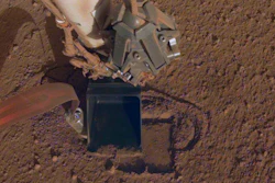 This October 2019 photo made available by NASA shows InSight's heat probe digging into the surface of Mars. On Thursday, Oct. 17, 2019, NASA says the drilling device has penetrated three-quarters of an inch (2 centimeters) over the past week, after hitting a snag seven months ago. While just a baby step, scientists are thrilled with the progress.
