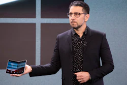 Microsoft's Chief Product Officer Panos Panay holds a Surface Duo at an event, Wednesday, Oct. 2, 2019 in New York.