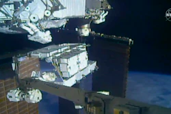 In this image made from video provided by NASA, NASA astronauts Christina Koch and Andrew Morgan work outside the International Space Station, Sunday, Oct. 6 2019. The astronauts kicked off the first of five spacewalks to replace old batteries at the International Space Station on Sunday.