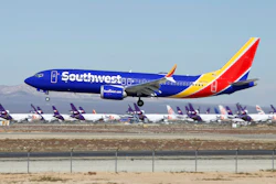 In this March 23, 2019 file photo a Southwest Airlines Boeing 737 Max aircraft lands at the Southern California Logistics Airport in the high desert town of Victorville, Calif. Southwest said Thursday, Oct. 17, that it will keep its Boeing 737 Max jets out of its schedule until Feb. 8, about a month longer than previously planned.