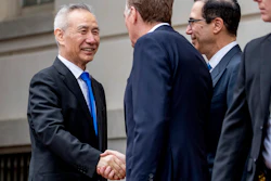 In this May 10, 2019, file photo, China's Vice Premier Liu He, left is greeted by U.S. Treasury Secretary Steve Mnuchin, second from right, and U.S. Trade Representative Robert Lighthizer, third right, as he arrives at the Office of the United States Trade Representative in Washington. China's Ministry of Commerce said Tuesday that Liu is going to Washington on Thursday for talks aimed at ending the tariff war.